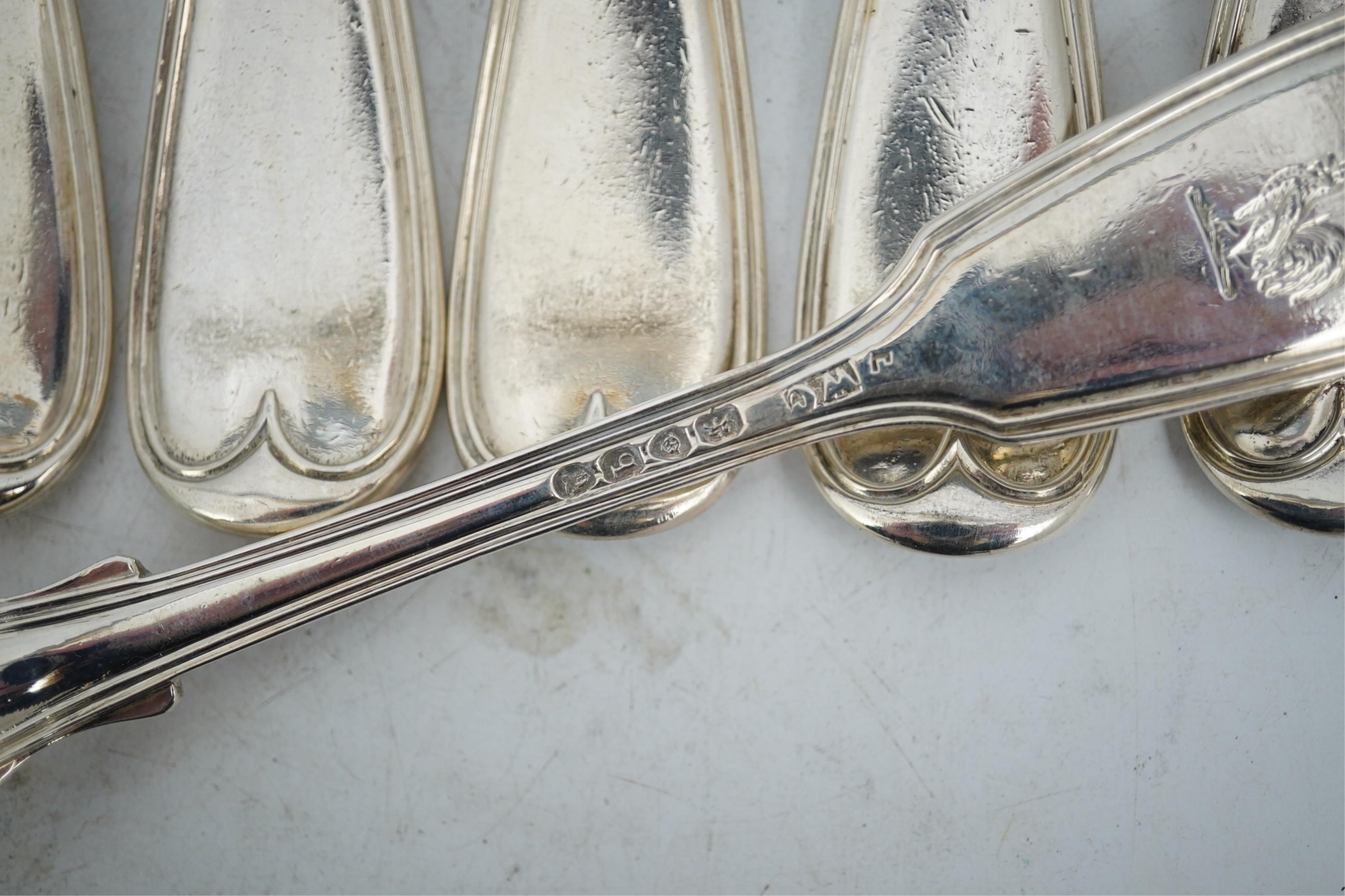 A set of twelve William IV silver double struck fiddle and thread pattern table forks, William Chawner II, London, 1831, 34.2oz.